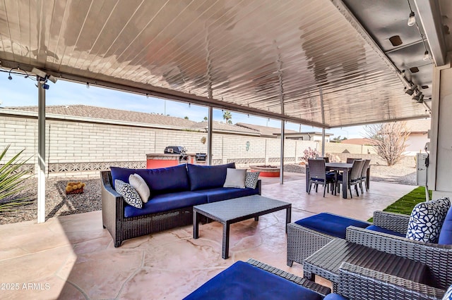 view of patio / terrace featuring outdoor lounge area and a grill