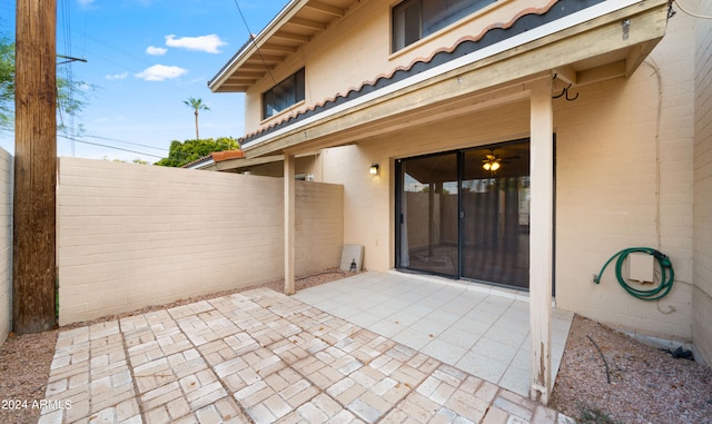 entrance to property featuring a patio