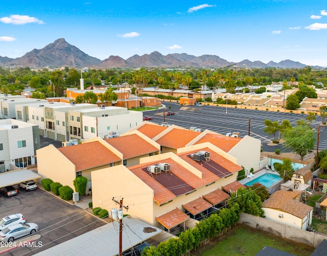 birds eye view of property featuring a mountain view