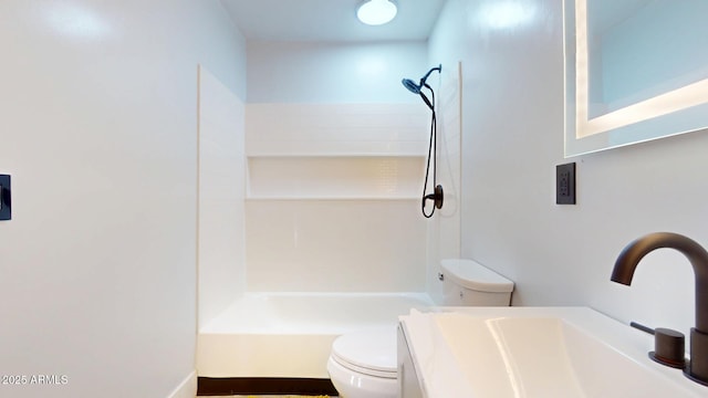 full bathroom with vanity, toilet, and washtub / shower combination