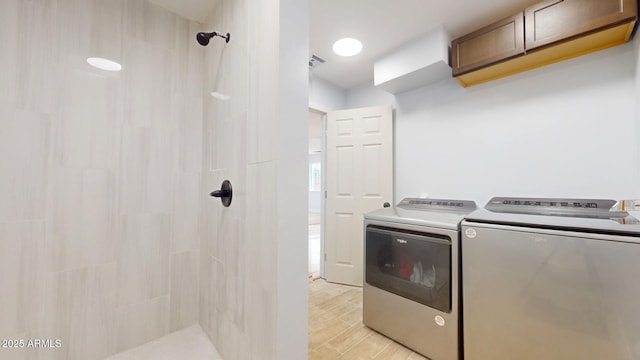 laundry room featuring separate washer and dryer