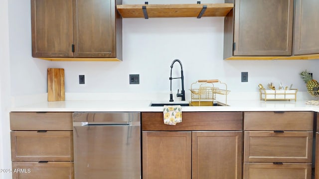 kitchen featuring dishwasher and sink