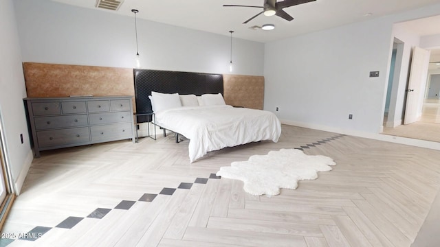 bedroom featuring ceiling fan and light parquet flooring