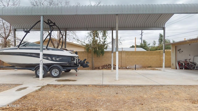 view of parking featuring a carport