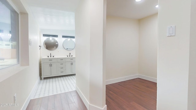 bathroom featuring vanity and wood-type flooring