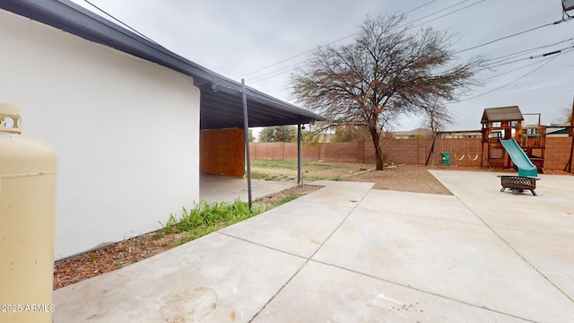 view of patio with a playground