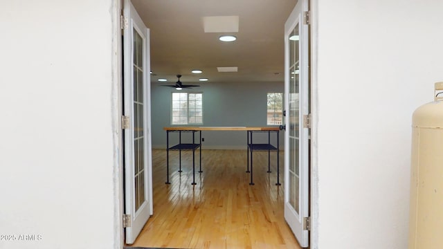 hallway featuring light hardwood / wood-style flooring