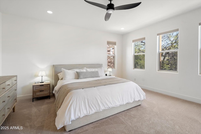 bedroom with ceiling fan, baseboards, carpet, and recessed lighting