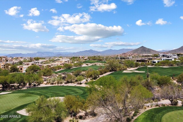 exterior space featuring a mountain view and view of golf course