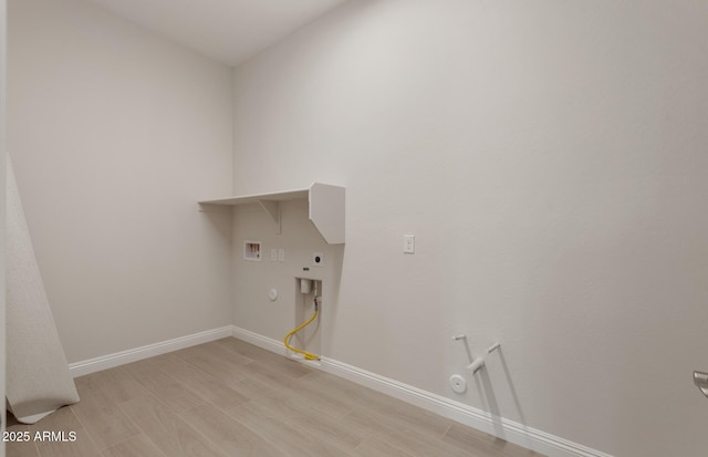 26696 W Siesta Ln, Buckeye, AZ 85396 - laundry area with light wood finished floors, washer hookup, laundry area, baseboards, and gas dryer hookup