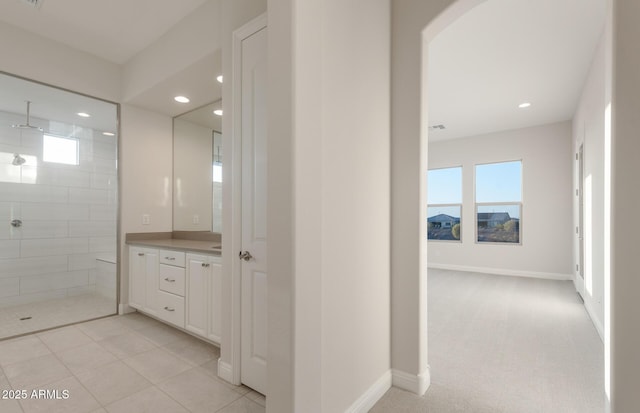 26696 W Siesta Ln, Buckeye, AZ 85396 - full bathroom with vanity, baseboards, recessed lighting, and a walk in shower