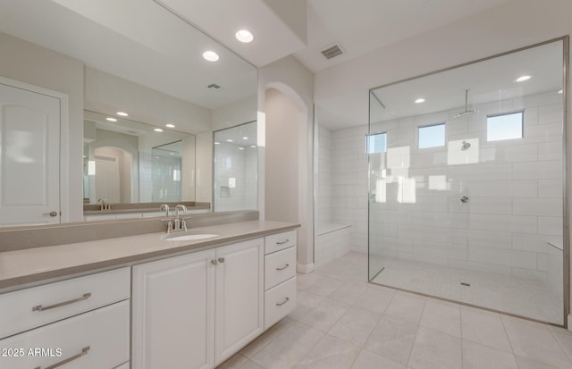 26696 W Siesta Ln, Buckeye, AZ 85396 - full bath with visible vents, recessed lighting, a walk in shower, and vanity