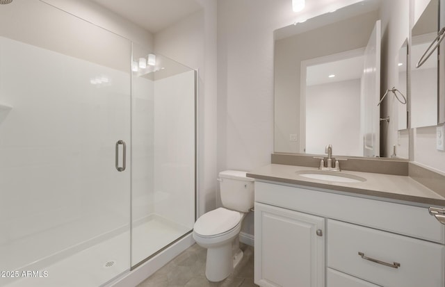 26696 W Siesta Ln, Buckeye, AZ 85396 - bathroom with toilet, vanity, and a stall shower