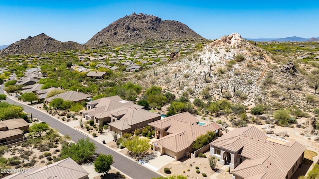 birds eye view of property with a residential view and a mountain view