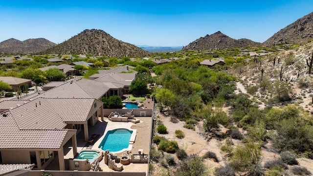bird's eye view with a mountain view and a residential view