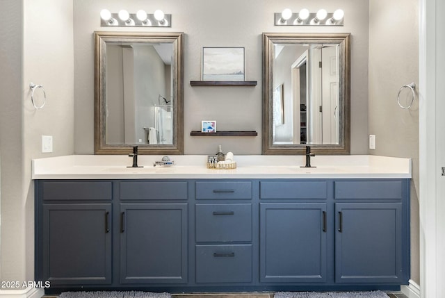 full bath featuring double vanity and a sink