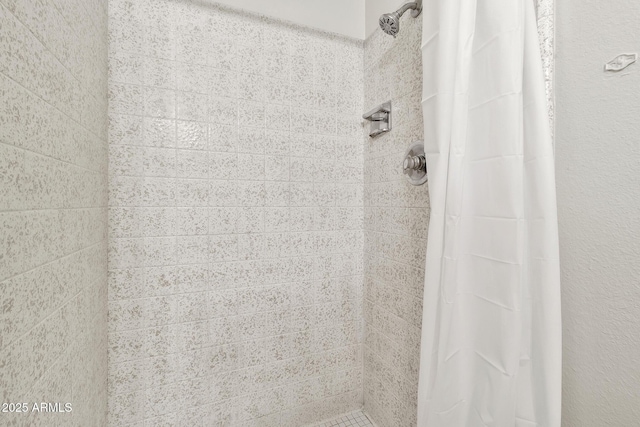 bathroom featuring curtained shower