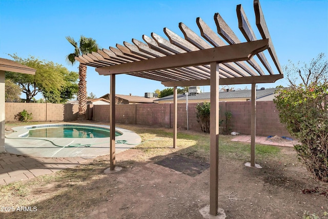 view of swimming pool featuring a patio and a pergola