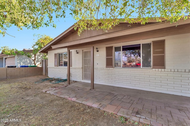 view of front of house with a patio