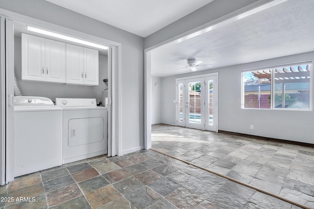 laundry area with cabinets, independent washer and dryer, ceiling fan, and french doors