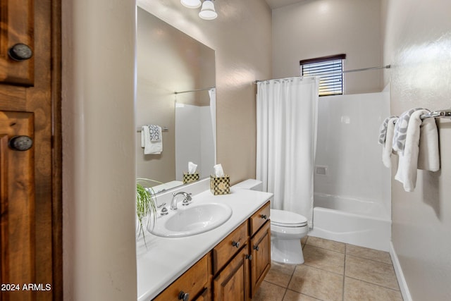 full bathroom with tile patterned floors, vanity, toilet, and shower / bath combo