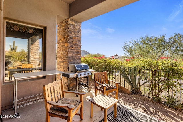 view of patio featuring a grill