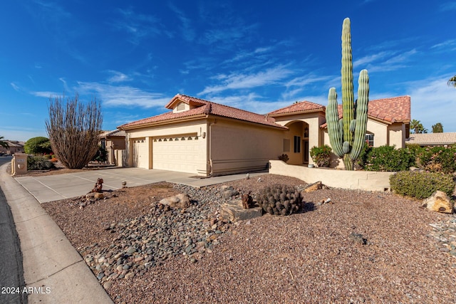 view of front of property featuring a garage