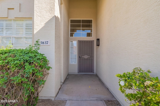 3837 E Windsong Dr, Phoenix, AZ 85048 - view of exterior entry featuring stucco siding