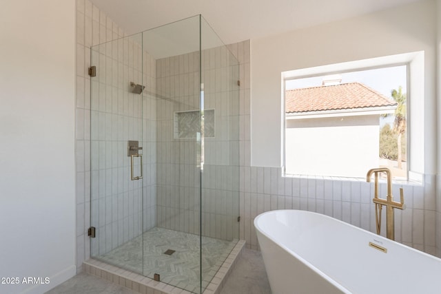 3837 E Windsong Dr, Phoenix, AZ 85048 - full bath with a freestanding bath, a shower stall, tile walls, and a sink