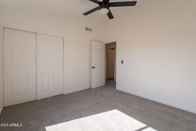 3837 E Windsong Dr, Phoenix, AZ 85048 - unfurnished bedroom with carpet floors, lofted ceiling, a closet, baseboards, and ceiling fan