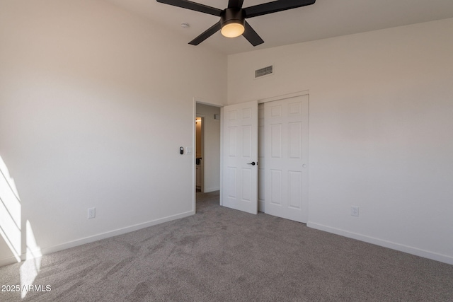 3837 E Windsong Dr, Phoenix, AZ 85048 - unfurnished bedroom with carpet floors, lofted ceiling, baseboards, a ceiling fan, and a closet