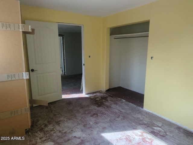 unfurnished bedroom with a closet