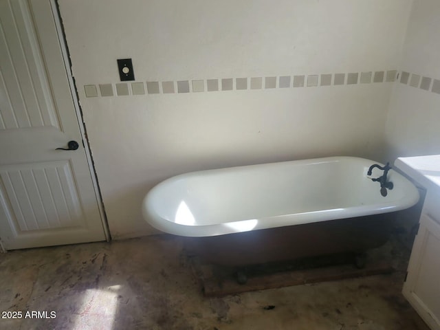 bathroom with a freestanding bath