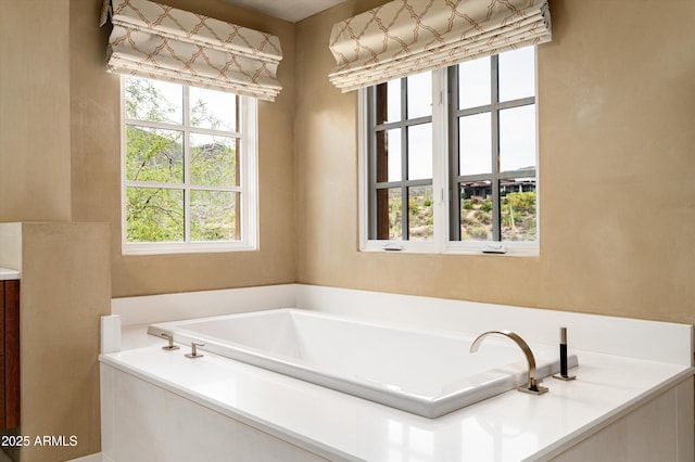 full bath featuring a garden tub