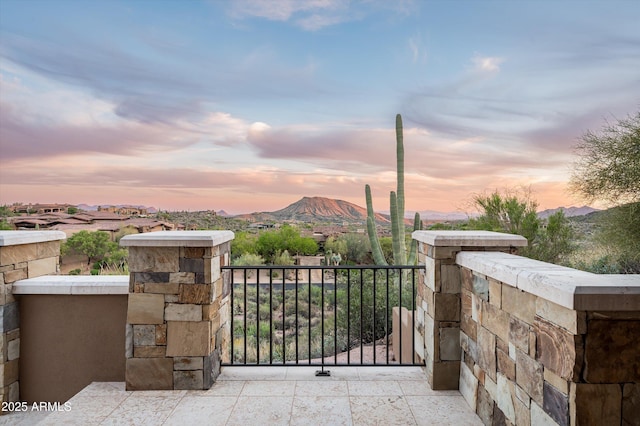 view of gate featuring a mountain view