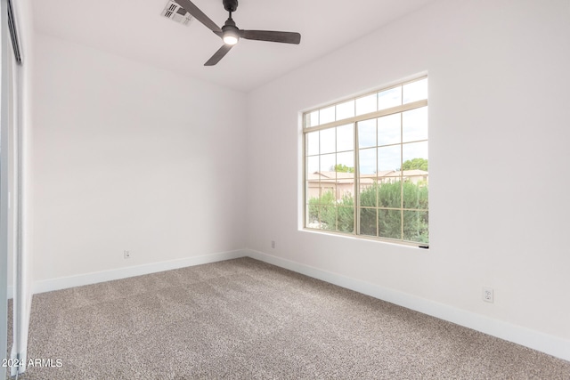 carpeted empty room with ceiling fan