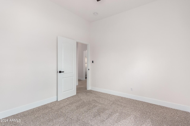 empty room featuring carpet floors