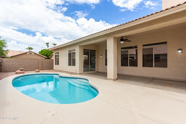 view of pool featuring ceiling fan and a patio area