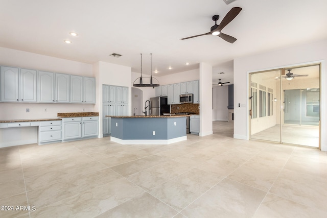 kitchen with light tile patterned floors, stainless steel appliances, ceiling fan, and gray cabinetry