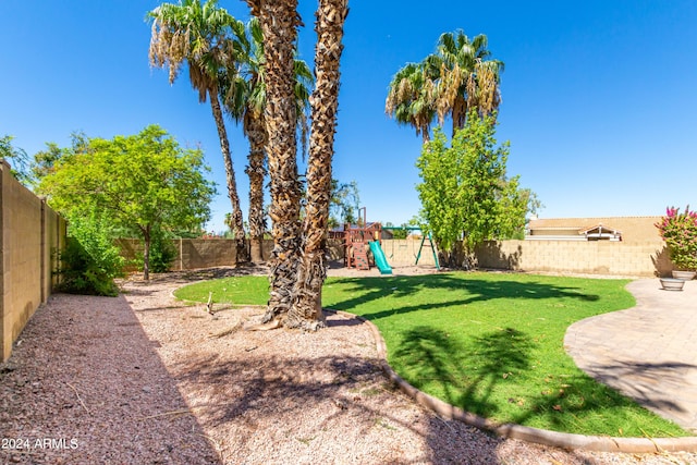 view of yard with a playground