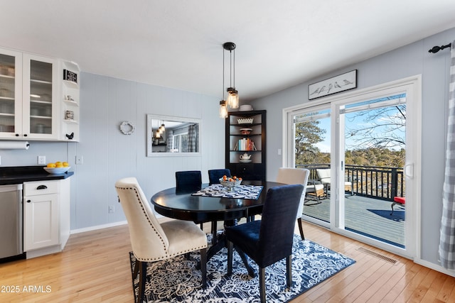 dining room with light hardwood / wood-style flooring