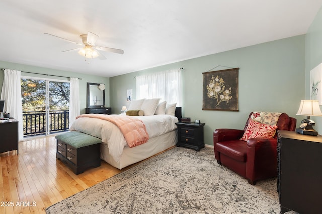 bedroom with access to exterior, ceiling fan, and light wood-type flooring