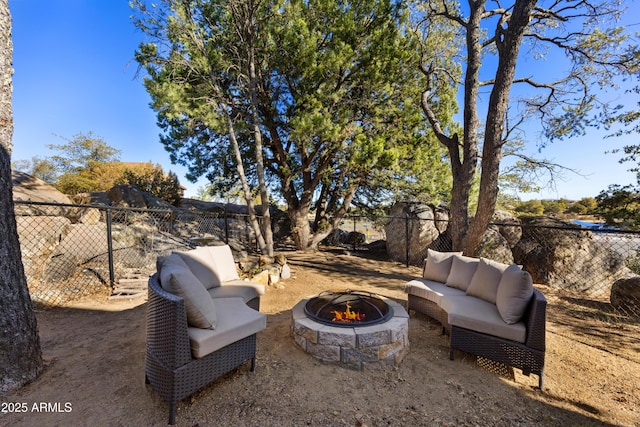 view of patio with a fire pit