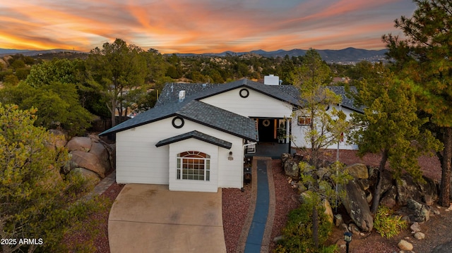 view of front of house featuring a mountain view