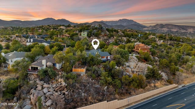 aerial view at dusk with a mountain view