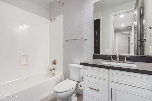 full bathroom featuring vanity, shower / bathtub combination, and toilet