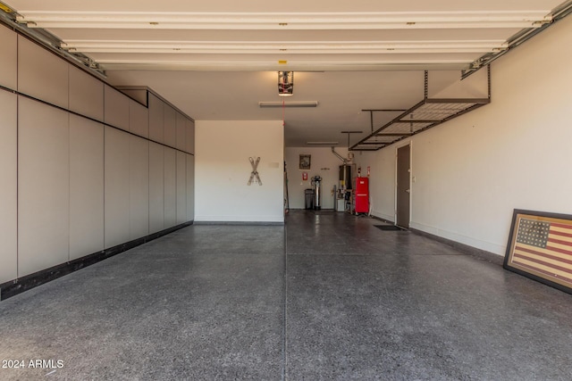 garage featuring gas water heater