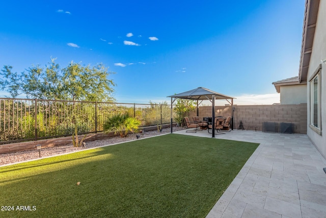 view of yard with a gazebo and a patio area