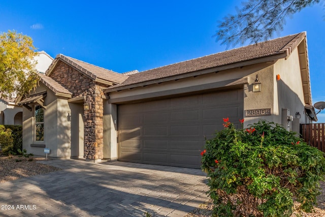 view of front of home with a garage