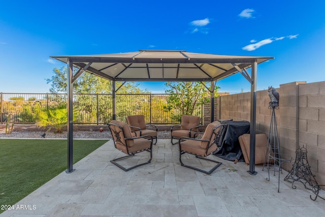 view of patio with a gazebo and an outdoor hangout area